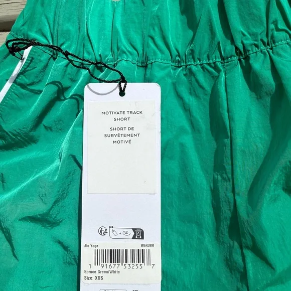 ALO Yoga Motivate Track Short Green/White - Picture 3 of 3